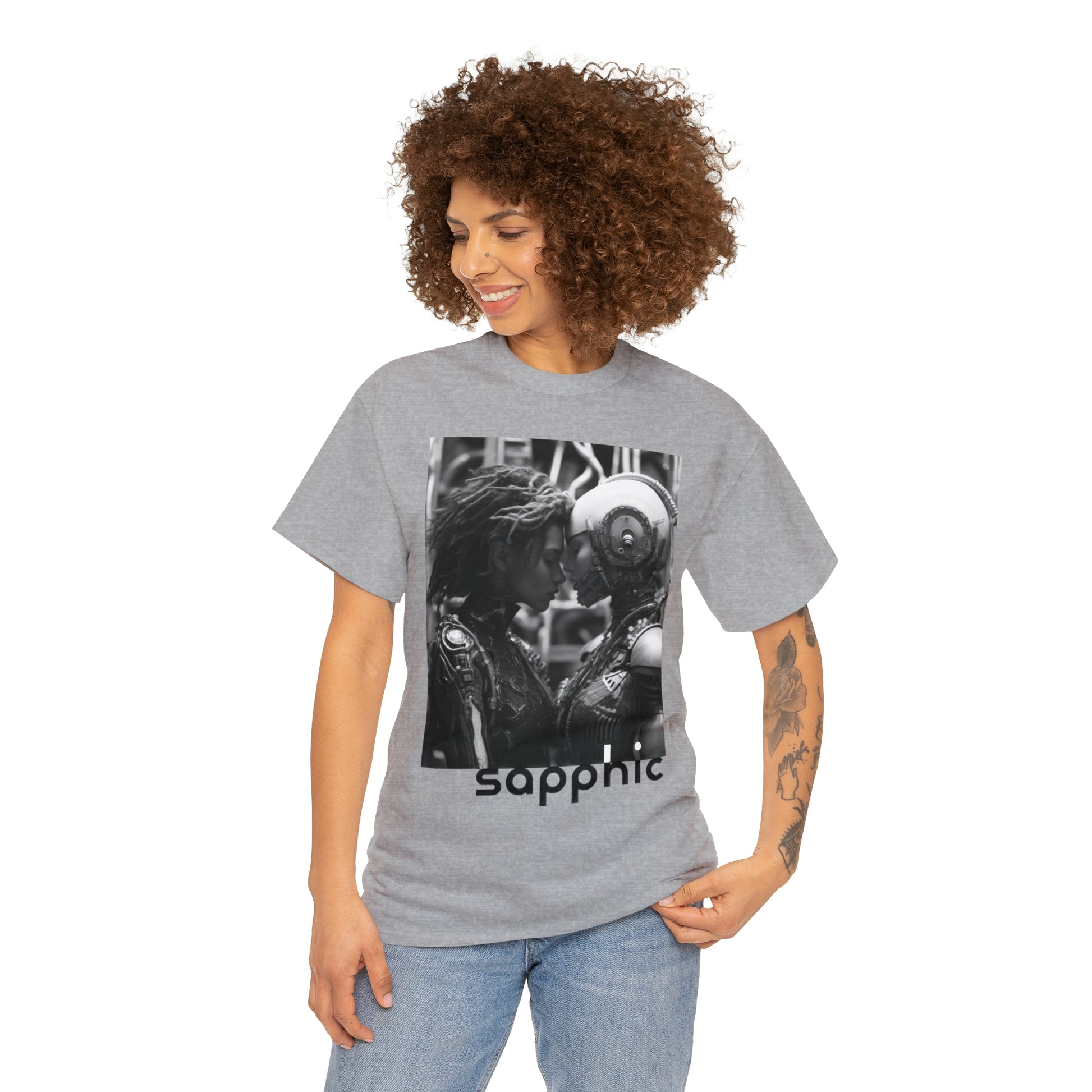 Mockup of a woman wearing jeans and a sport-grey-colored t-shirt; the t-shirt displays a black and white image of two sapphic cyborgs with foreheads together and eyes closed in a romantic scene.