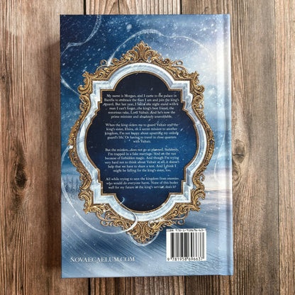 Back cover of the unsigned hardcover "An Elemental Husband: The King's Weaver Book 4" by Novae Caelum, showing the book's blurb text in an ornate silver-and-gold frame over a snowy background, with the ISBN barcode and novaecaelum.com website at the bottom.
