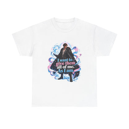 White unisex t-shirt with fantasy art of a person with dark curly hair in a long black fur-trimmed coat, surrounded by swirling pink and blue ribbons of magic, and the quote "I want to give them all of me. As I am."