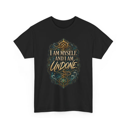 Black unisex t-shirt with a gold Celtic knot and compass motif framed by teal filigree and stars, and the quote "I am myself. And I am undone."
