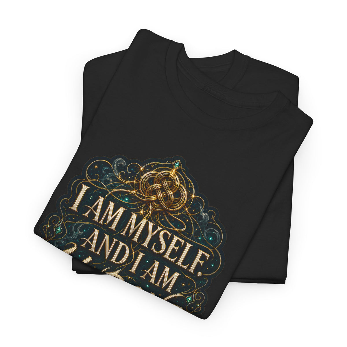 Two folded black unisex t-shirts stacked together, showing the gold Celtic knot and compass design with the quote "I am myself. And I am undone."