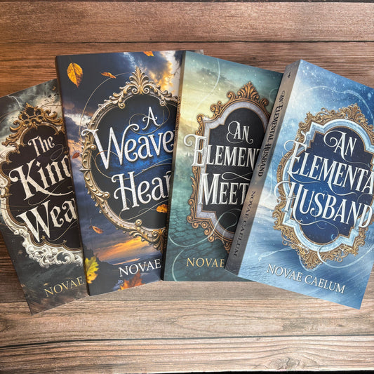 Stack of four fanned paperback books from The King's Weaver series by Novae Caelum—The King's Weaver, A Weaver's Heart, An Elemental Meeting, and An Elemental Husband—on a wood-plank surface.