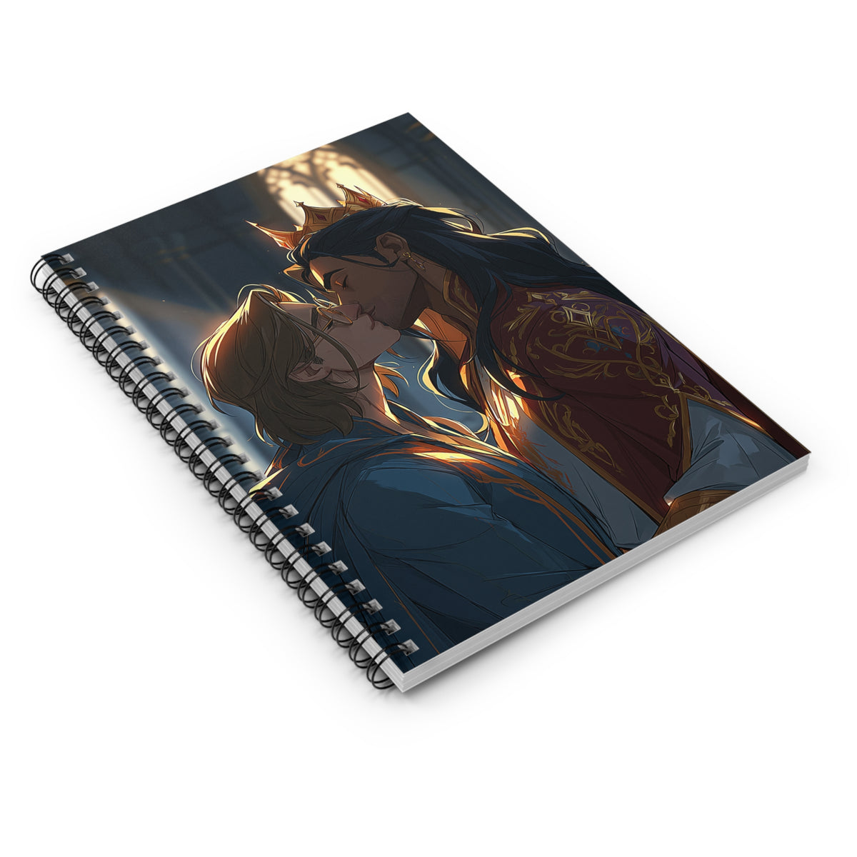 Spiral notebook lying at a three-quarter angle, showing the romantic cover art of a crowned dark-haired man kissing a light-haired man in a sunlit cathedral.