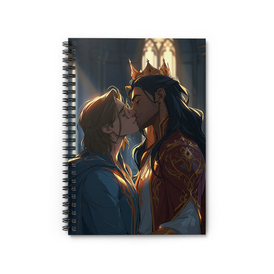 Spiral notebook standing upright, romantic fantasy cover art of two men kissing: one with dark hair wearing a gold crown and an ornate red-and-gold robe, the other with light wavy hair in a blue coat, lit by a glowing stained-glass window.